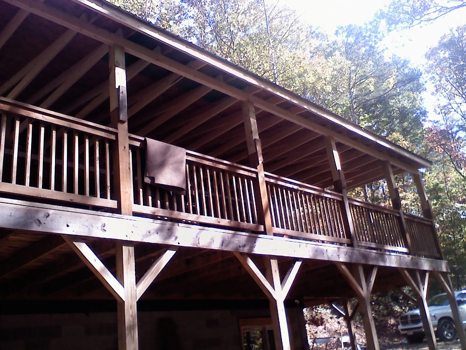 Timber framing under a new elevated porch and deck — Roof Leak Repair in Haugan by Roofing Brothers